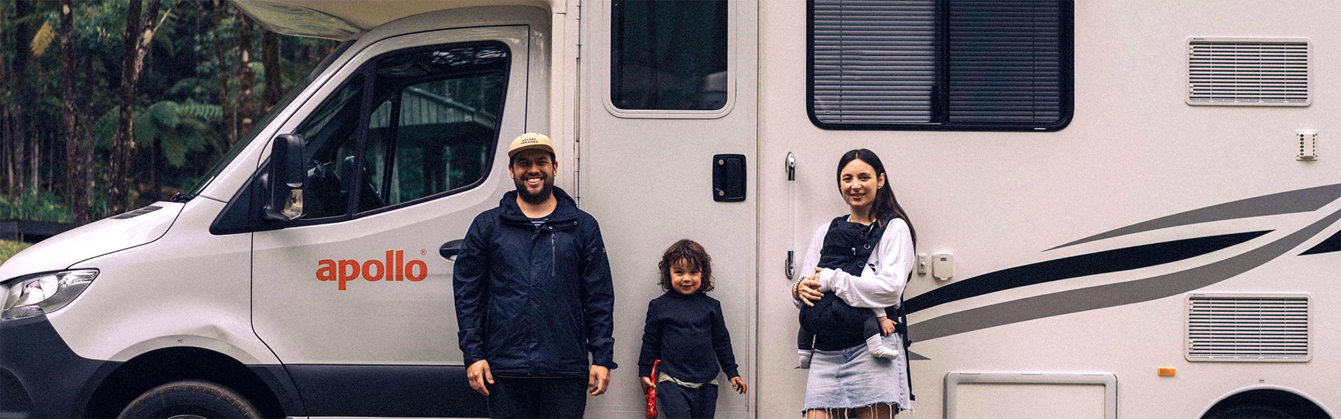 Family in front of Apollo Motorhome